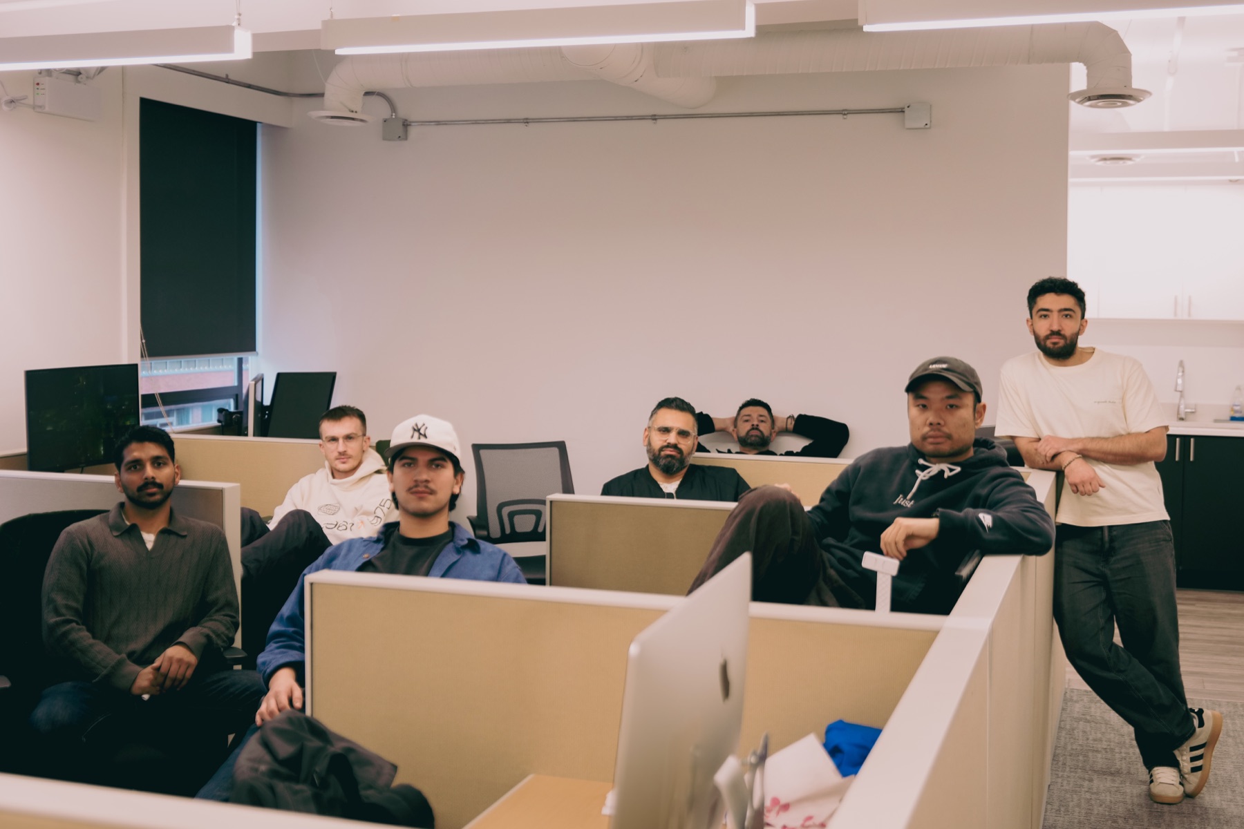 A group of Althra founders gathered in the Vancouver office.